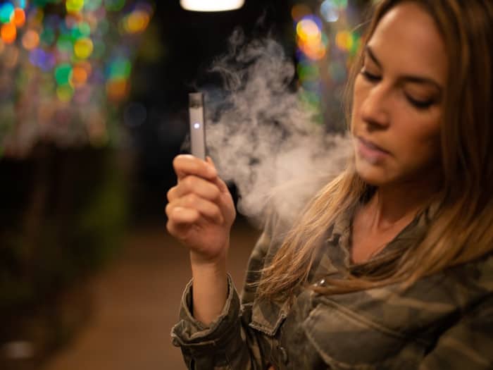 woman using a vape
